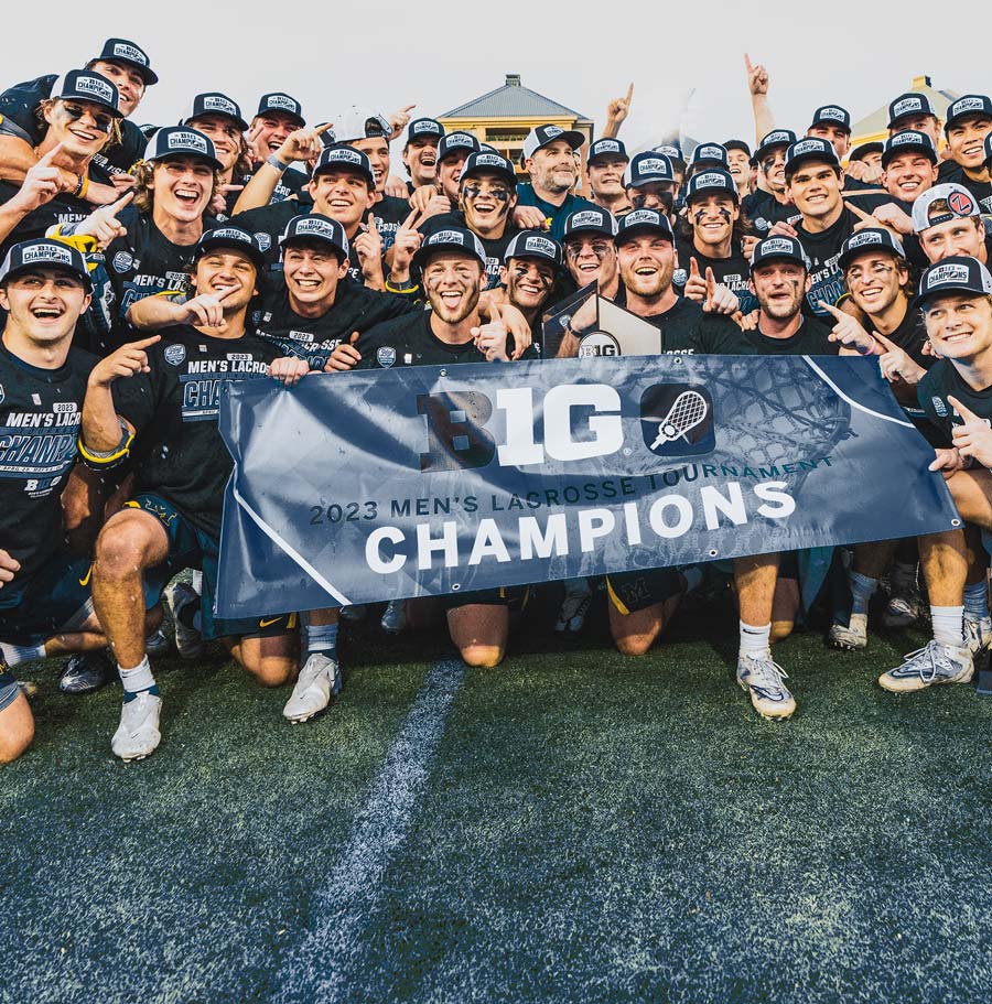 Team holding championship sign