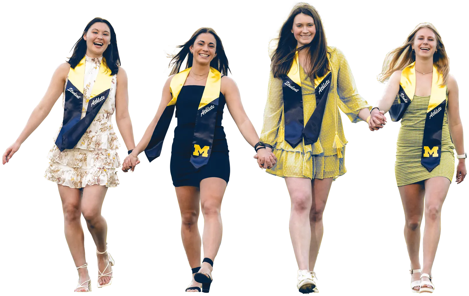 Graduates walking on field