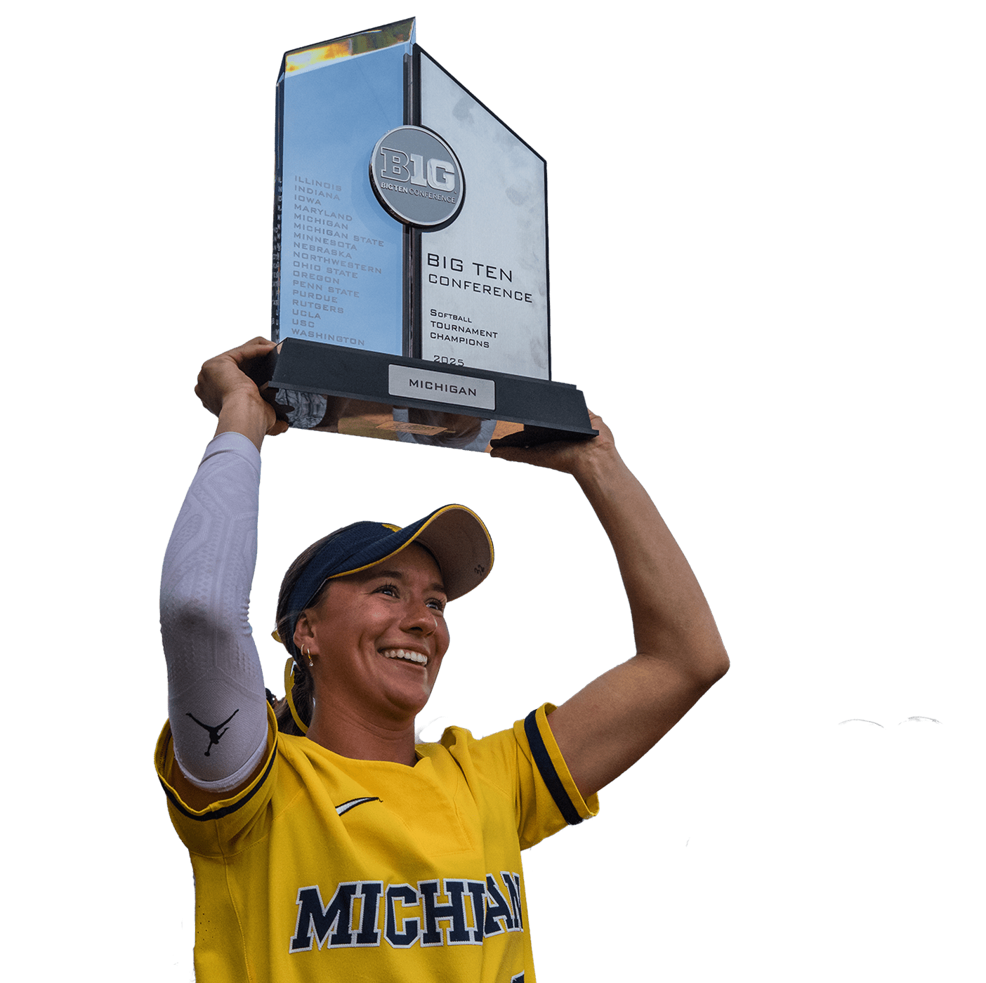 Softball player lifting trophy