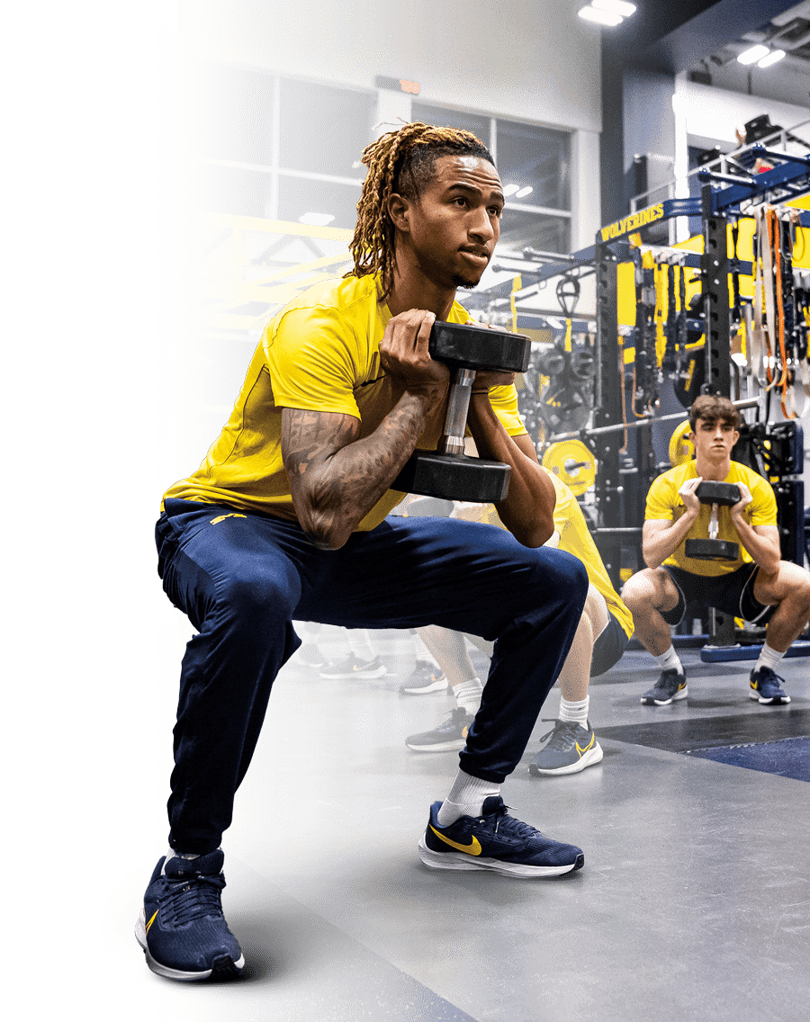 athletes lifting weights