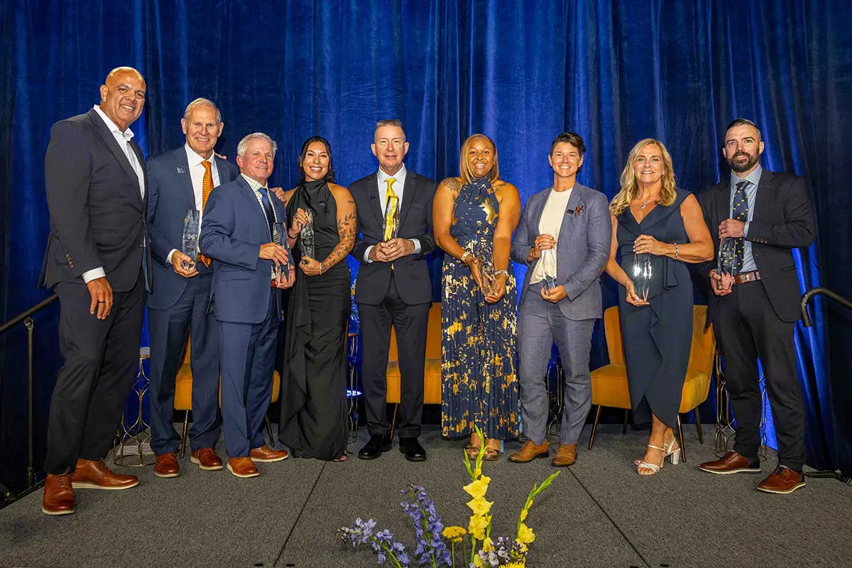Attendees standing on the stage at the 2026 Hall of Honor ceremony